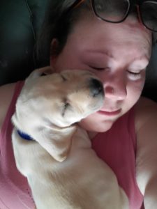 Bodhi with Lisa when he was 10 weeks old.