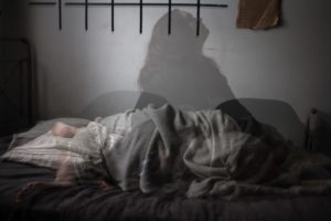 Woman wanting to get out of bed